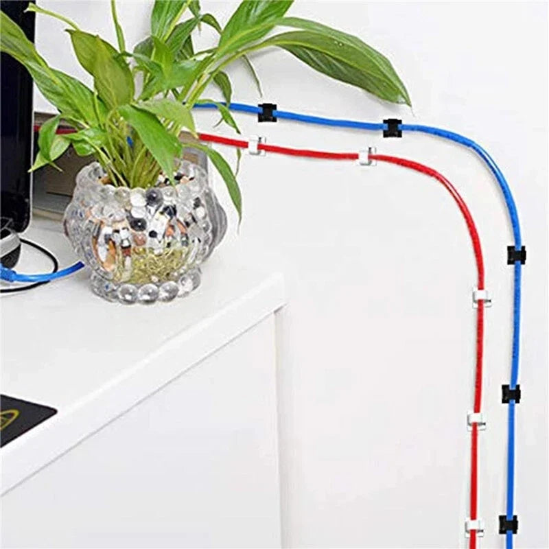 Example of clips organising leads along a smooth surface