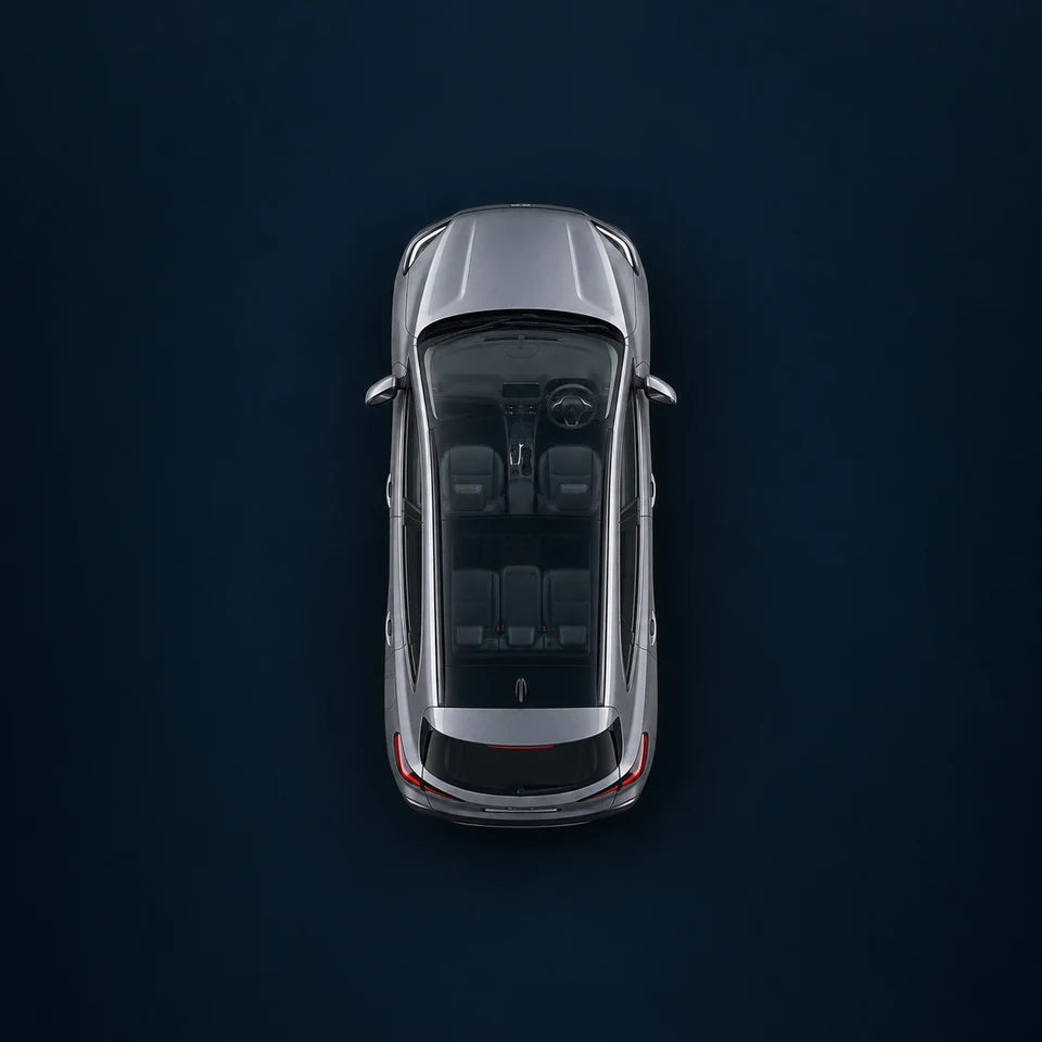 Realistic overhead right-hand-drive vehicle with coloured camera viewing cones; front of vehicle is at the top